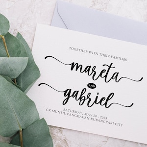 May include: A white wedding invitation with black calligraphy announcing the wedding of Mareta and Gabriel. The wedding will take place on Saturday, May 20, 2025 at CK Muntil Pangkalan Kubangpari City.