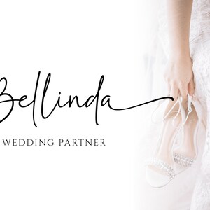 May include: A white wedding dress with a lace pattern. The dress is being held by a person wearing white heels. The text "Bellinda Wedding Partner" is written in black cursive.