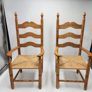 Pair of doll Arm chair sign C.G Muller ladder back rush seat solid oak