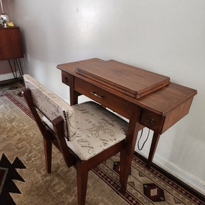 Singer sewing machine in walnut two draw cabinet 1950s with chair AJ854 337