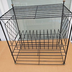 Mid-century modern wrought-iron record rack brass feet 13 slots black