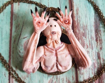 Pale man pan's labyrinth necklace