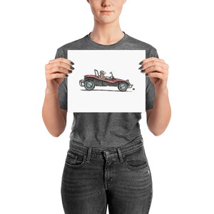 May include: A red dune buggy with a person driving. The dune buggy has black wheels and a white background.