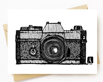 May include: A black and white line drawing of a vintage film camera with a textured design.