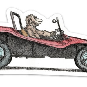 May include: A red dune buggy with a black interior and a monkey driving. The monkey is wearing a brown fur coat and has a white face.