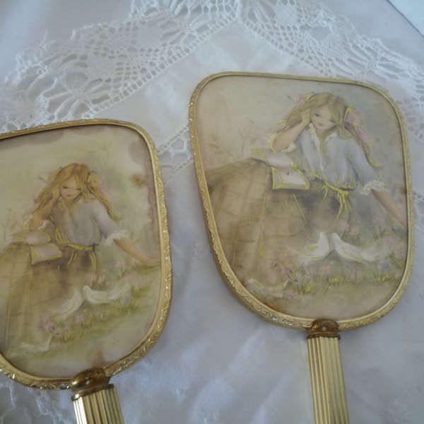 Beautiful antique gilded set of old golden hairstyle, hand mirror, brush, romantic, vintage girl