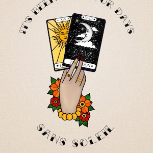 May include: A hand holding two tarot cards, one with a sun and the other with a moon. The cards are surrounded by flowers and the text "IT'S BEEN DARK FOR DAYS SANS SOLEIL" is written in a vintage style font. The text "STACEY AULD 2022" is also included.