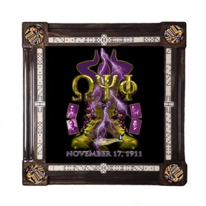 May include: A wooden domino game board with a black central design. The design includes purple and gold graphics, lightning bolts, and Greek letters. The text "NOVEMBER 17, 1911" is displayed. The board is surrounded by dominoes.
