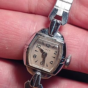 Vintage Timex Ladies Hand-Wind Watch: Chrome Bezel, Stretch Silver Band (Not Working)