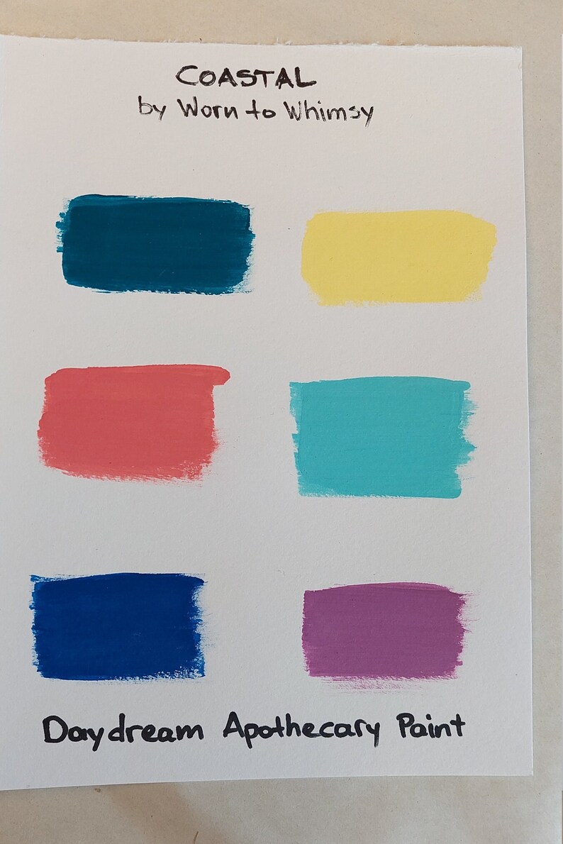 May include: Six paint colour swatches labelled "Coastal by Worn to Whimsy" and "Daydream Apothecary Paint". The colours are teal, yellow, coral, turquoise, blue, and purple.