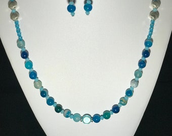 Necklace 25" and Earrings with Miracle bead, Quartz stone beads and silver shell accents.