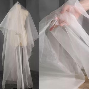 Vitt organzatyg, mullbärssidenstyg, lätt tyg, halvtransparent tyg, haute couture brudklänningstyg, klädtyg, A155