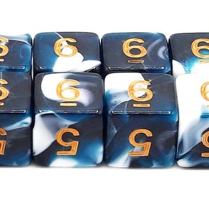 May include: Set of ten blue and white dice with gold numbers. The dice have a swirling pattern and are numbered 6 and 9.