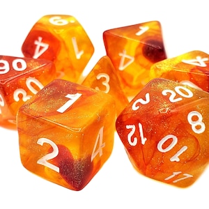 May include: A set of six orange and red dice with white numbers. The dice are translucent and have a swirling pattern inside.