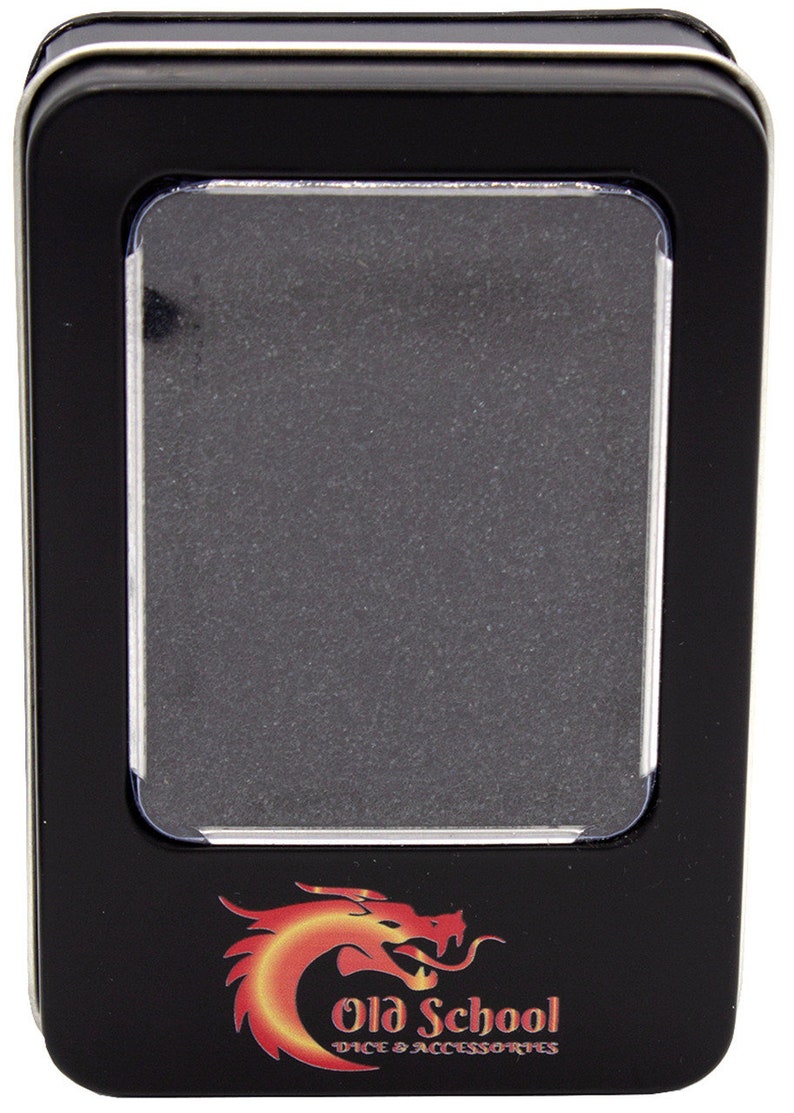 May include: Black rectangular tin with a clear plastic window. The tin features a red and yellow dragon logo with the text "Old School Dice & Accessories". The tin is designed to store dice.