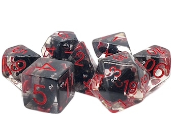 May include: Set of six clear dice with black and red swirls and red numbers. The dice are translucent and show the swirls inside.