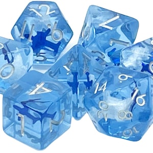 May include: A set of six blue dice with white numbers. The dice are translucent and have a swirling pattern inside.