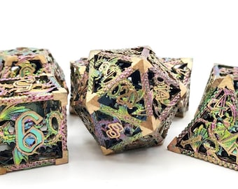 May include: Set of iridescent gold and green metal dice with a dragon design. The dice are numbered 1 through 6 and have a detailed, intricate design.