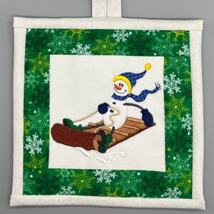 Snowy Celebration-snowman on Toboggan
