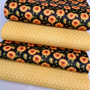 May include: Four pieces of fabric, two with a woven texture and two with a sunflower pattern on a black background.