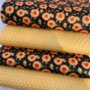 May include: Four pieces of fabric, two with a woven texture and two with a sunflower print on a black background.