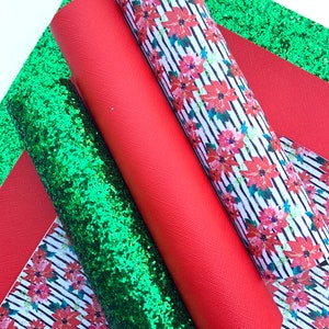 May include: Three rolls of fabric for crafting projects. One roll is red, one is green glitter, and one has a white and black striped pattern with red poinsettia flowers.
