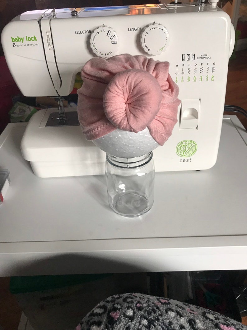 Pink baby turban with bun