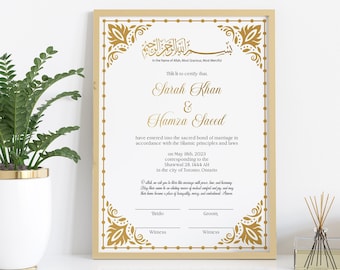 May include: A gold framed certificate with an ornate border and Arabic calligraphy. The text reads "This is to certify that Sarah Khan & Hamza Saeed have entered into the sacred bond of marriage in accordance with the Islamic principles and laws on May 18th, 2023 corresponding to the 28th, 1444 H in the city of Toronto, Ontario."