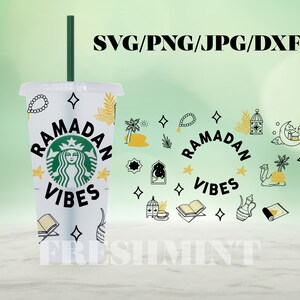 May include: White reusable cup with a black and green Starbucks logo and the text "Ramadan Vibes". The cup is decorated with stars, a crescent moon, and other Ramadan-themed designs.