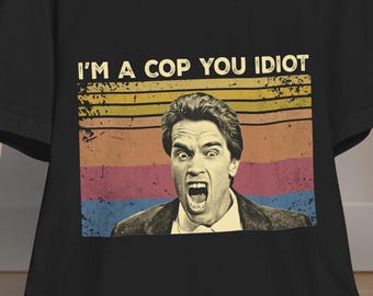 Arnold Schwarzenegger T-Shirt – "I’m a Cop, You Idiot" Movie Quote Tee