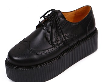 black patent platform brogues