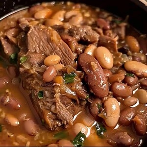 May include: A close-up of a hearty stew with chunks of meat and a variety of beans, including white beans and red beans. The stew is in a brown pot and has a rich, savoury broth.