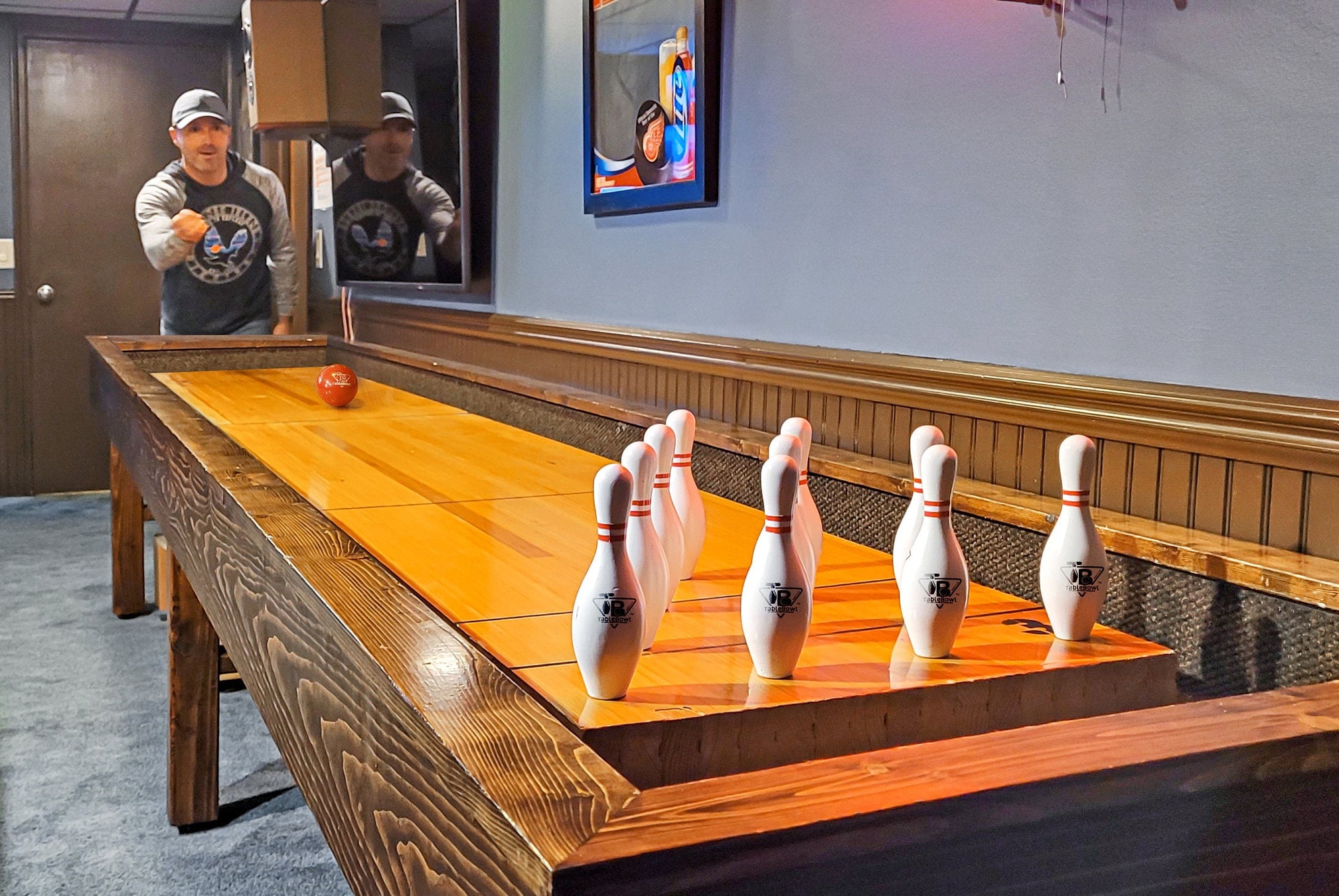 Electronic shuffleboard on sale bowling table