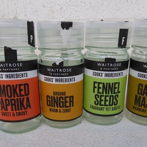 Assorted spices, spice jars, glass pots