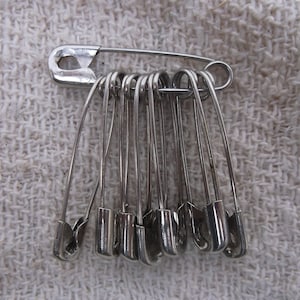 Bundles of steel safety pins