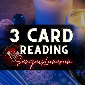 May include: A 3 card reading with the text "3 CARD READING Sanguis Lunarum" on a dark background with two lit candles and a blue gemstone.