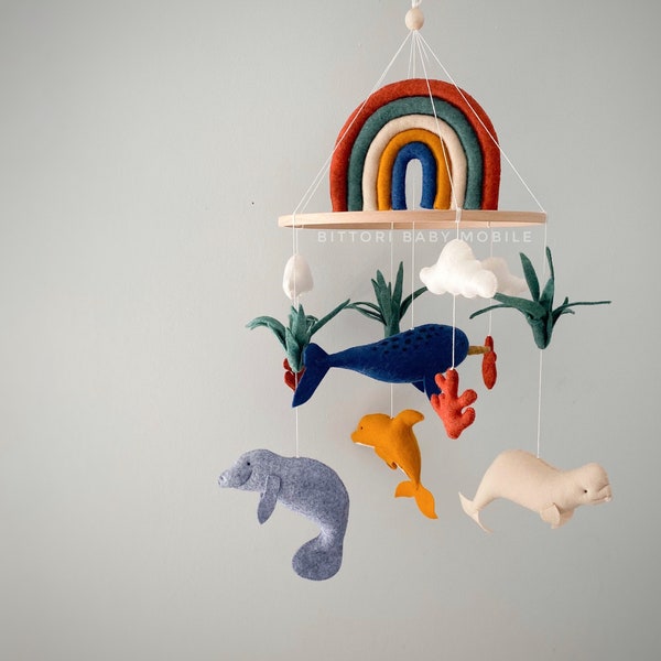 Boho nursery decor with narwhal beluga dolphin manatee Ocean mobile with rainbow in mustard green terracotta palette expecting mom gift