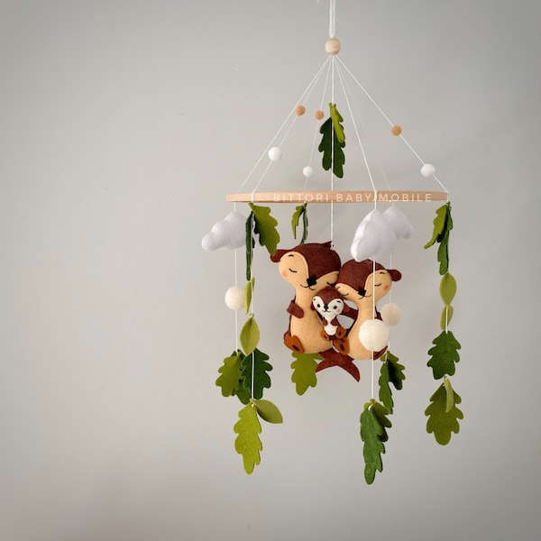 Otter nursery mobile with oak leaves. Woodland nursery decor with cute otter family. Gender neutral baby gift. Woodland baby shower gift.