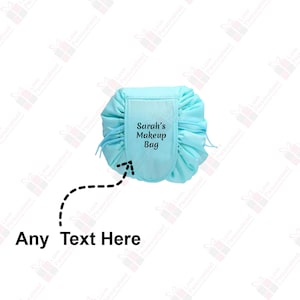 May include: A light blue drawstring makeup bag with the text "Sarah's Makeup Bag" embroidered on the front.
