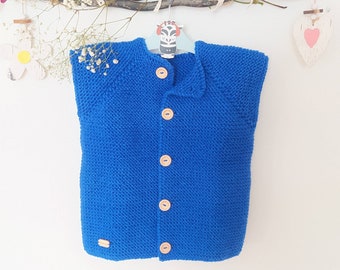 Soft and warm vest made of virgin wool in blue, hand-knitted, suitable for sizes 104-110