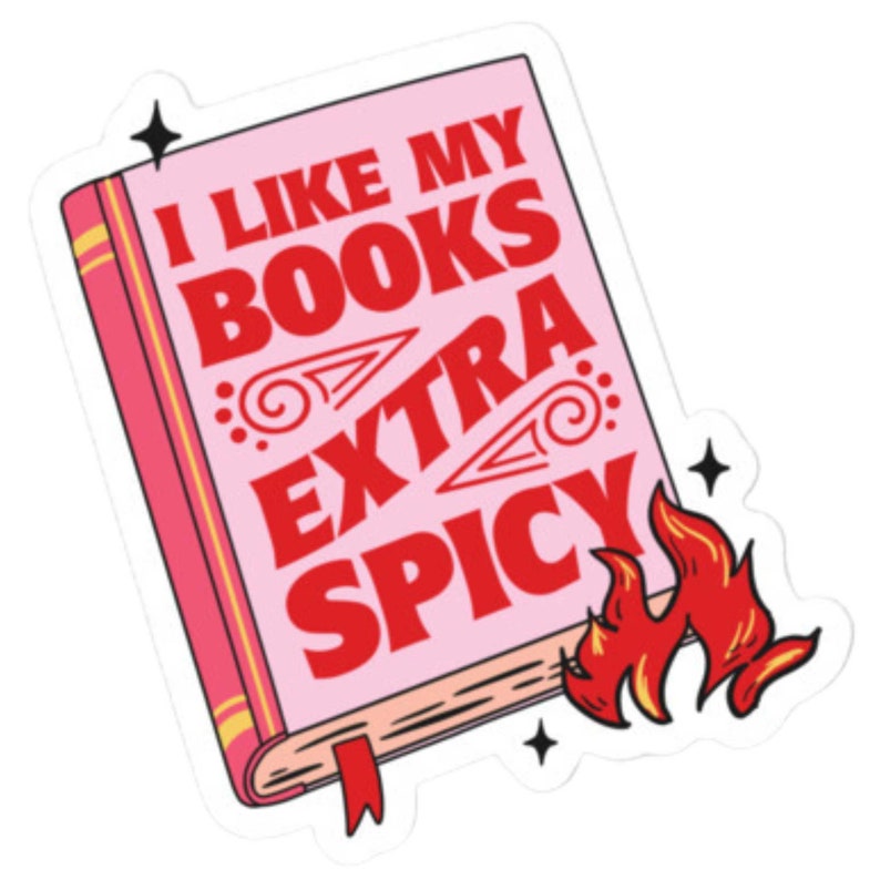 May include: A pink book sticker with the text "I like my books extra spicy" in red letters. A red flame is on the bottom right corner of the sticker.