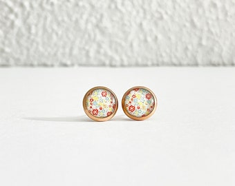 Handcrafted stud earrings. Cabochons made of resin and floral print, 8mm stainless steel studs, hypoallergenic.