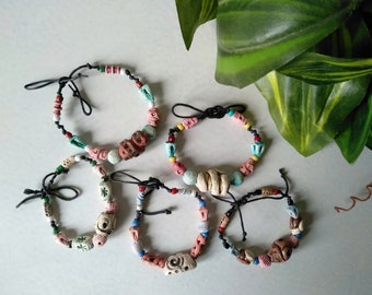 Ceramic bracelet with multi-colored handmade clay beads and seed beads. Jewelry from ceramics. Laconic collection.