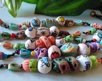 Ceramic bracelet with multi-colored handmade clay beads and seed beads. Jewelry from ceramics. Bright collection.
