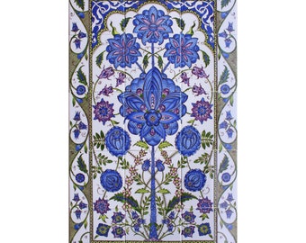 May include: A blue and white tile featuring a floral design. The tile is bordered by a green and gold frame. The design includes a central flower with a blue and white pattern, surrounded by smaller flowers and leaves.