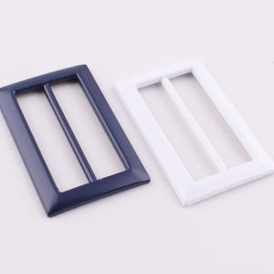 May include: Two metal belt buckle slides, one in navy blue and one in white. Both have a rectangular shape with two parallel slots.