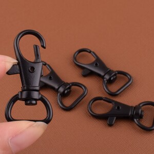 3/4 Black Swivel Hooks With Spring Snap Sold in Packs of 4 