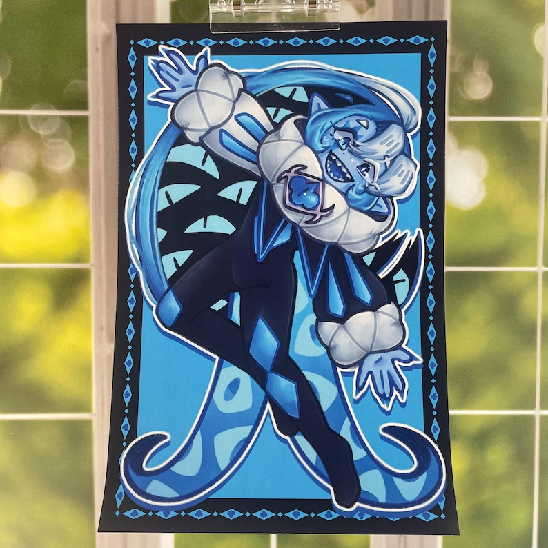 May include: A colourful illustration of a character in blue and black. The character has a white ruffled collar and cuffs, with a diamond pattern on the clothing. The background is light blue with a dark blue border.