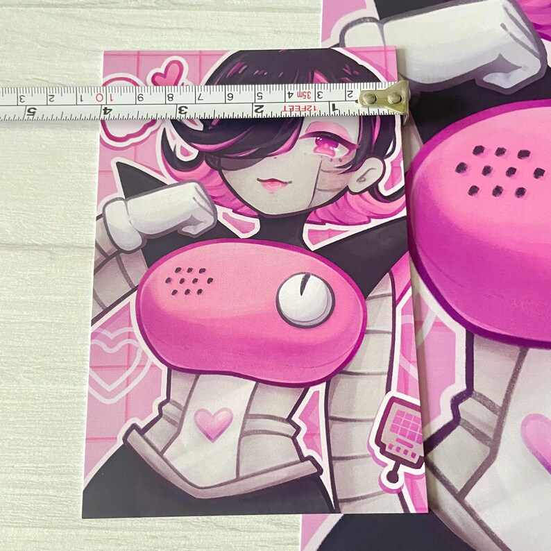 May include: A pink and white illustration of a robot with a pink phone on its chest. The robot has pink hair and a white and black outfit. The background is pink with white hearts.