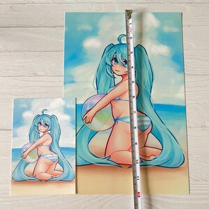 May include: A digital illustration of a blue-haired anime character wearing a blue and white bikini and holding a beach ball. The character is kneeling on a sandy beach with a blue ocean and sky in the background.